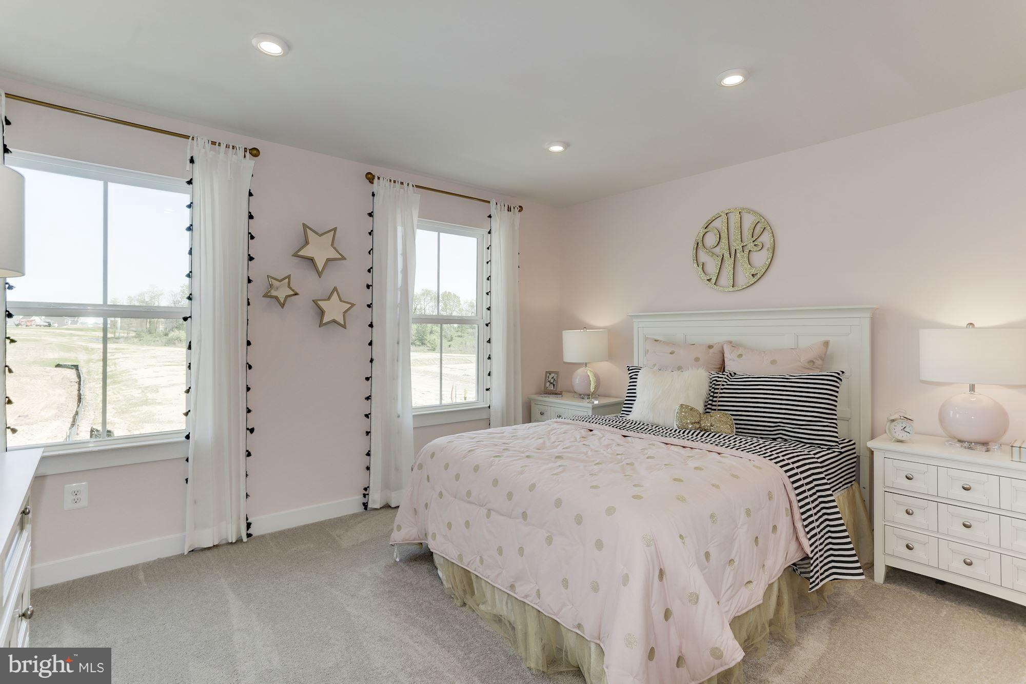 7641 Deepnotch Way Hanover, MD 21076 - Photo 16 of 25 a bedroom with a bed and a window