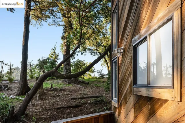 a view of a balcony with an outdoor space