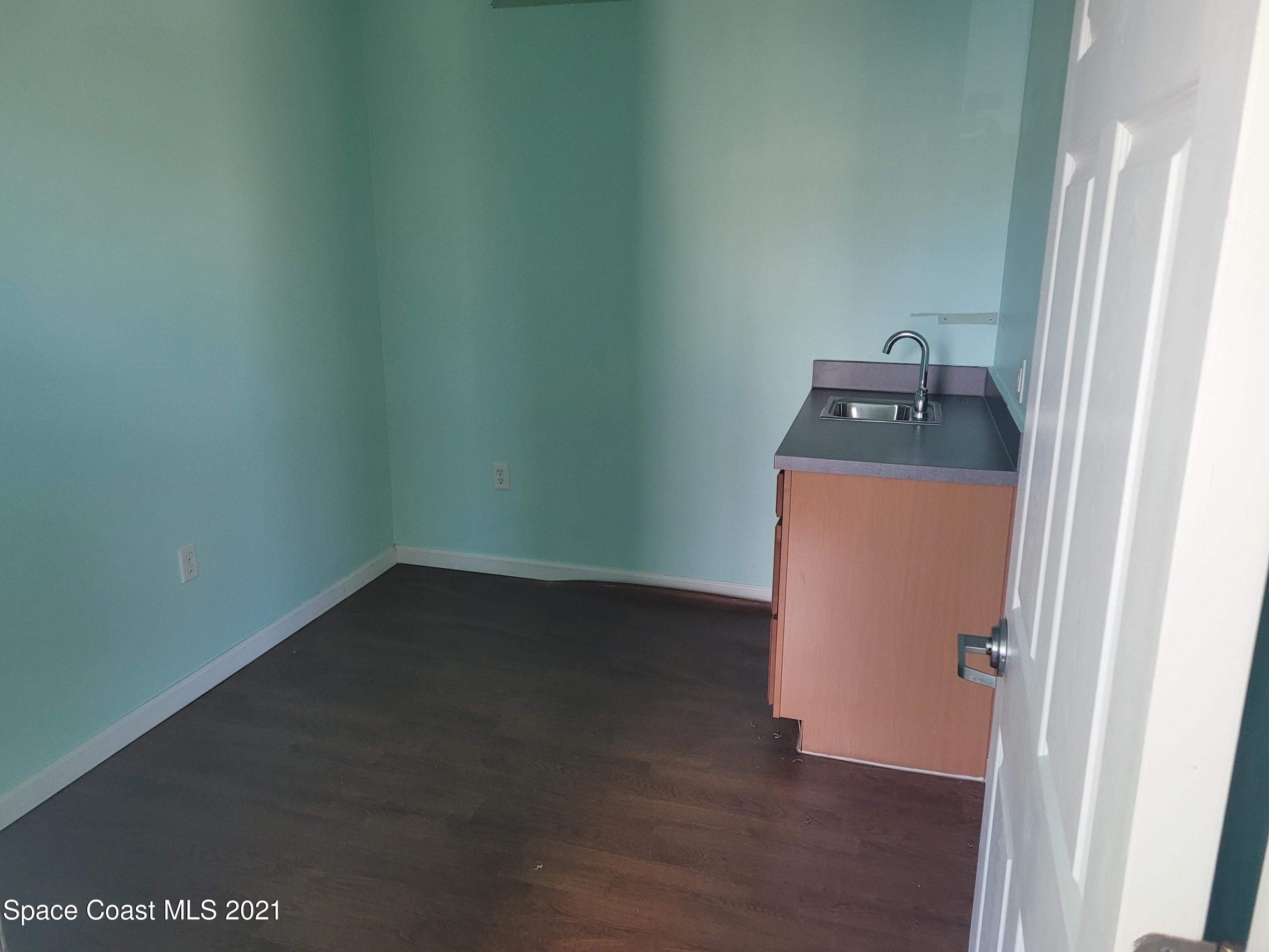 4531 North Wickham Road Melbourne, FL 32935 - Photo 5 of 12 20210505_111523