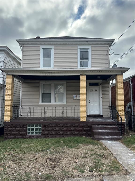 1131 12th Street McKees Rocks, PA 15136 - Photo 1 of 45 a view of a house with a yard and stairs