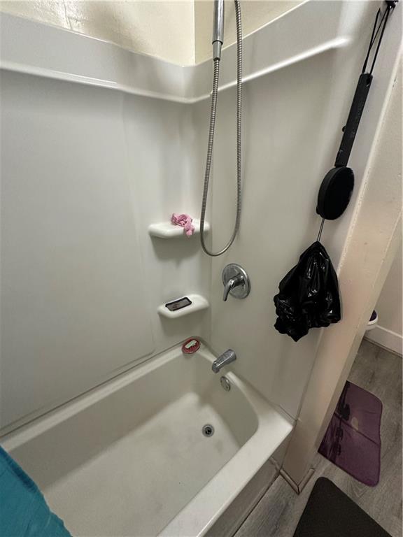 1131 12th Street McKees Rocks, PA 15136 - Photo 14 of 45 a bathroom with a tub and a shower