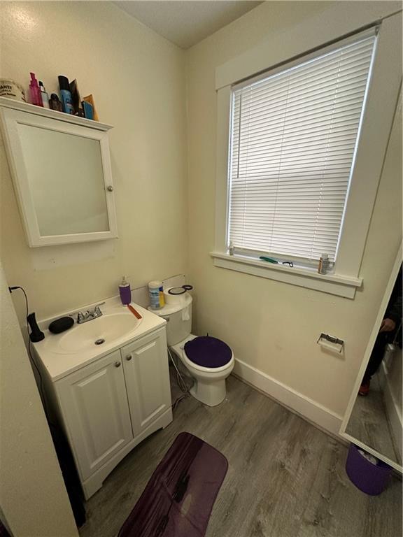 1131 12th Street McKees Rocks, PA 15136 - Photo 15 of 45 a bathroom with a toilet sink and mirror