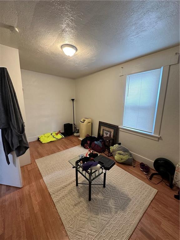 1131 12th Street McKees Rocks, PA 15136 - Photo 19 of 45 a living room with furniture and a flat screen tv