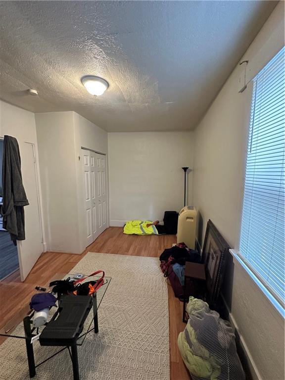 1131 12th Street McKees Rocks, PA 15136 - Photo 20 of 45 a bedroom with furniture and a window