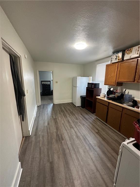 1131 12th Street McKees Rocks, PA 15136 - Photo 3 of 45 a kitchen with stainless steel appliances a refrigerator and a stove top oven