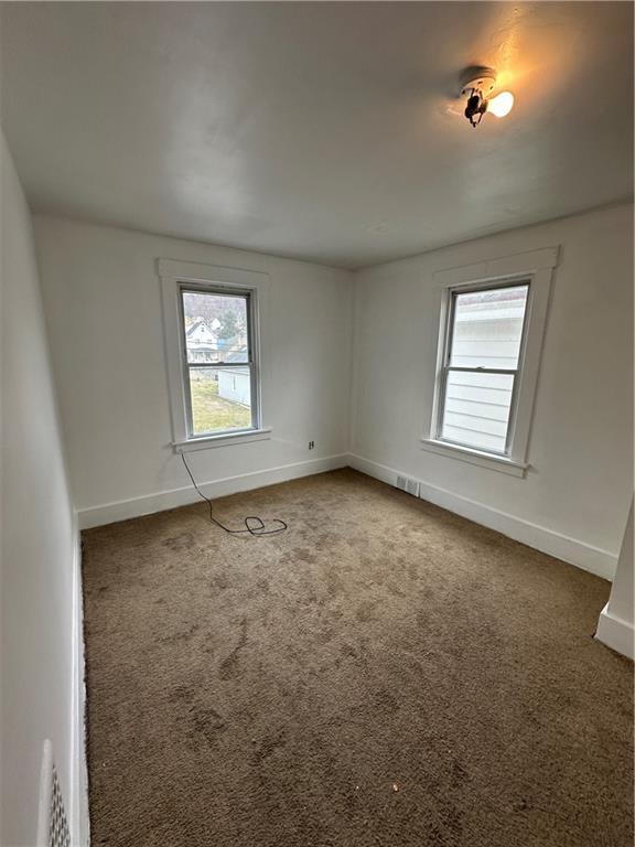 1131 12th Street McKees Rocks, PA 15136 - Photo 33 of 45 an empty room with windows