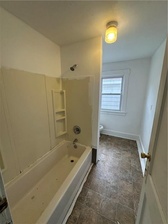 1131 12th Street McKees Rocks, PA 15136 - Photo 36 of 45 a bathroom with a tub and a shower