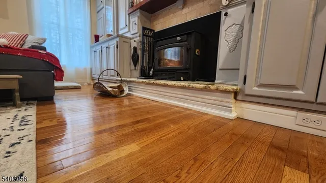 a living room with furniture fireplace and flat screen tv