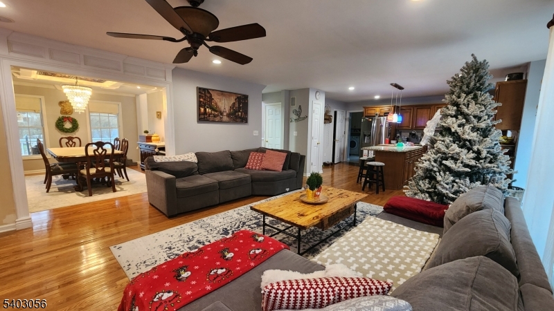 52 Fox Hollow Road Montague, NJ 07827 - Photo 23 of 45 a living room with furniture and a potted plant