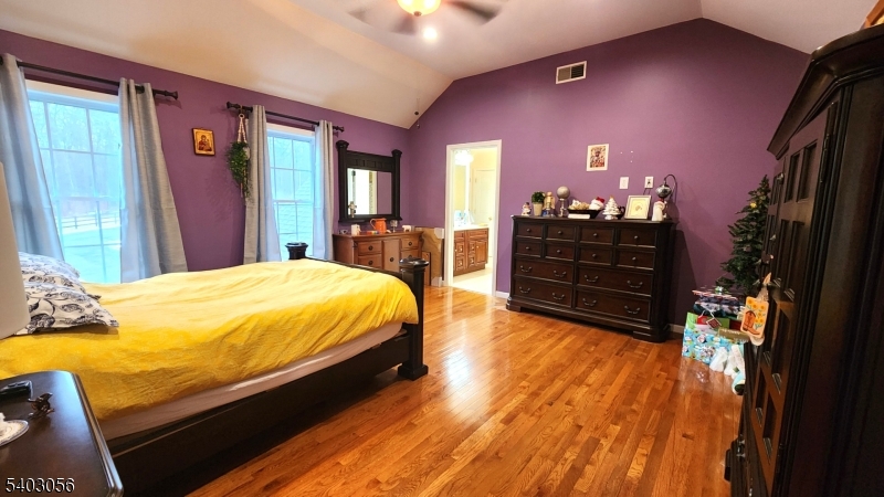 52 Fox Hollow Road Montague, NJ 07827 - Photo 28 of 45 a bed sitting in a bedroom next to a window