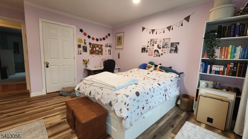 52 Fox Hollow Road Montague, NJ 07827 - Photo 43 of 45 a bedroom with a bed and a book shelf