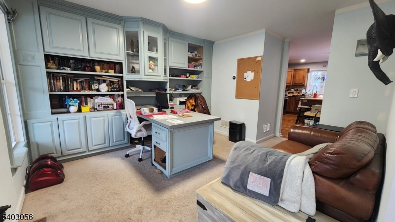 52 Fox Hollow Road Montague, NJ 07827 - Photo 5 of 45 a living room with furniture cabinets and window