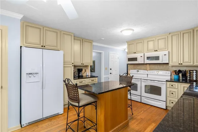 a bedroom with a bed and a fireplace