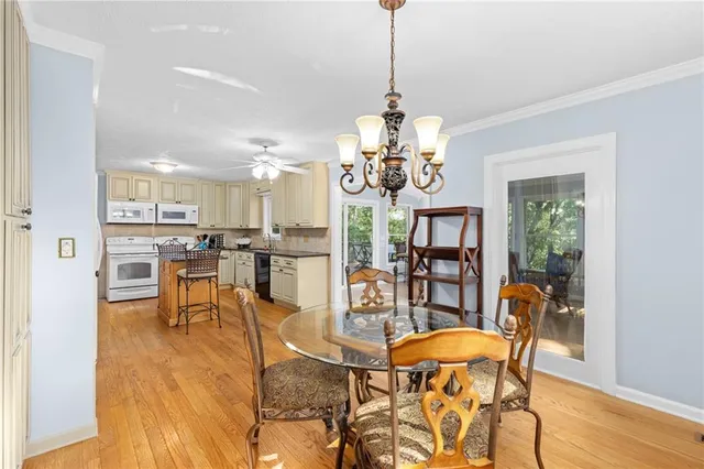 a bathroom with a tub shower and sink
