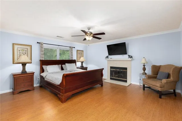 a bedroom with a bed and a hallway