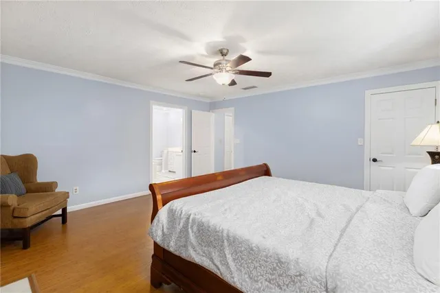 a view of a chairs and table on the wooden deck