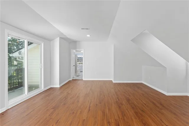 an aerial view of a house with a table and chairs