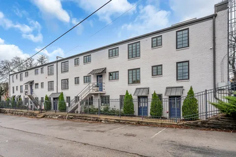 a front view of a building with street view