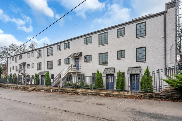 a front view of a building with street view
