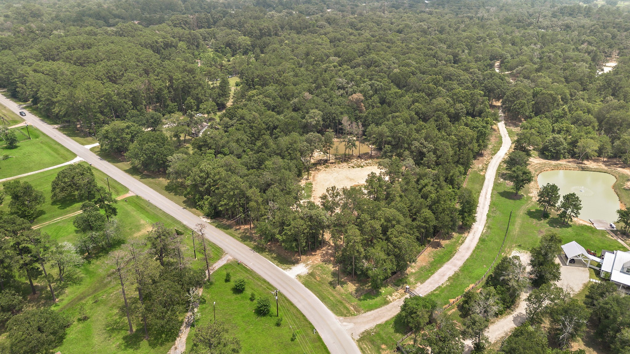28171 Joseph Road Hockley, TX 77447 - Photo 18 of 28 a view of a forest from a balcony