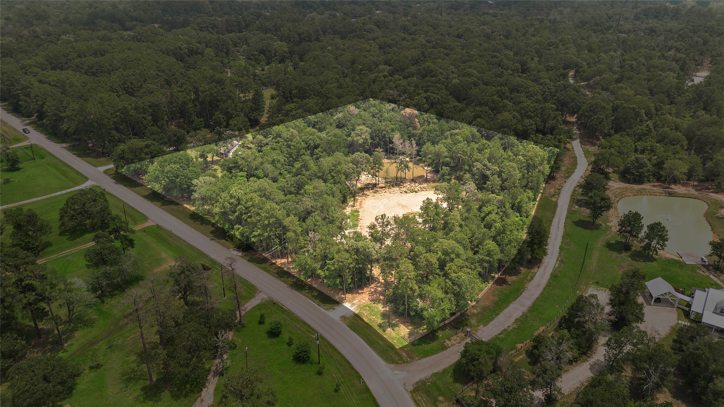 28171 Joseph Road Hockley, TX 77447 - Photo 2 of 28 a view of a garden