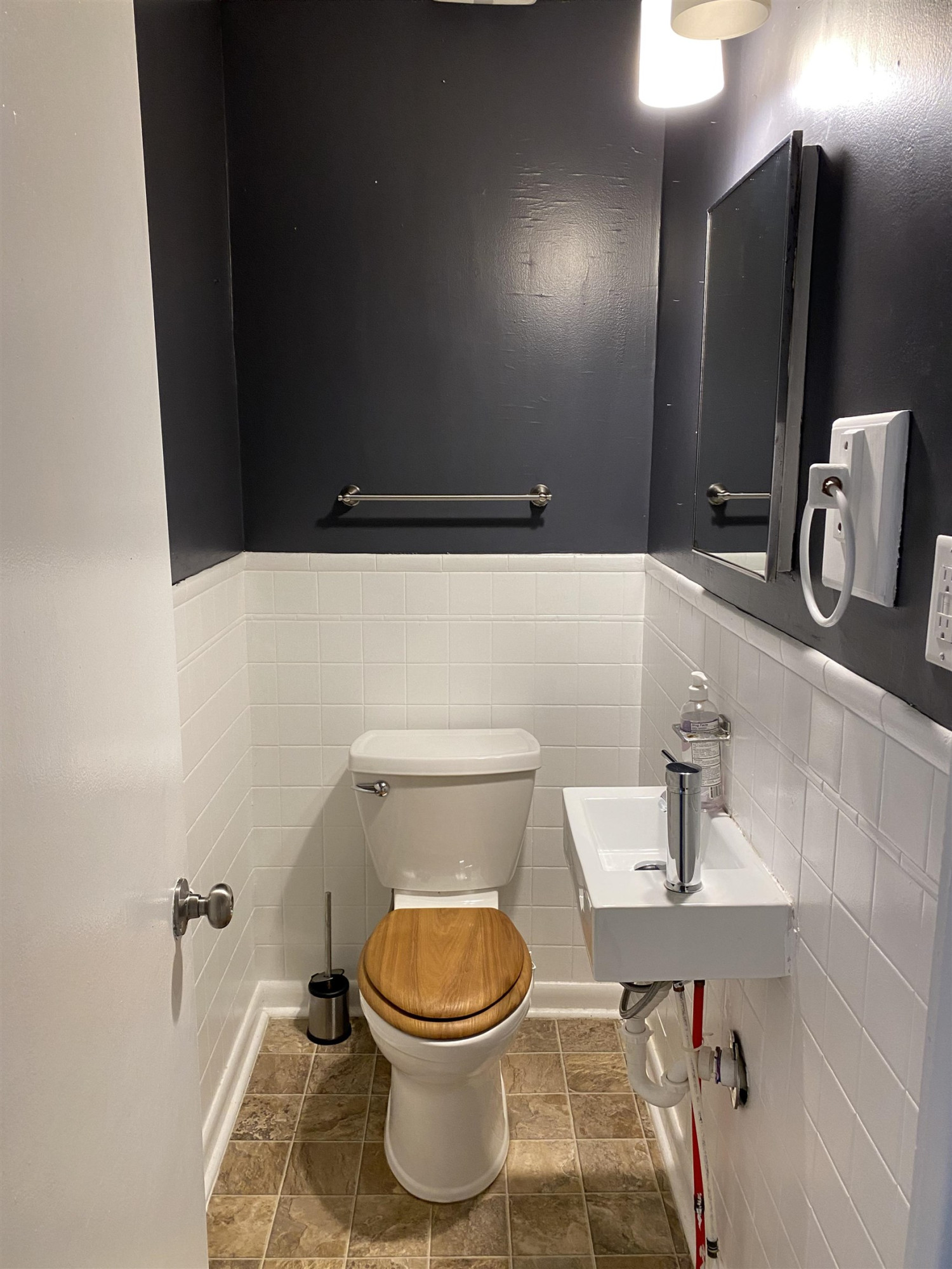 1613 Honeysuckle Road Raleigh, NC 27609 - Photo 17 of 24 a bathroom with a sink and a toilet