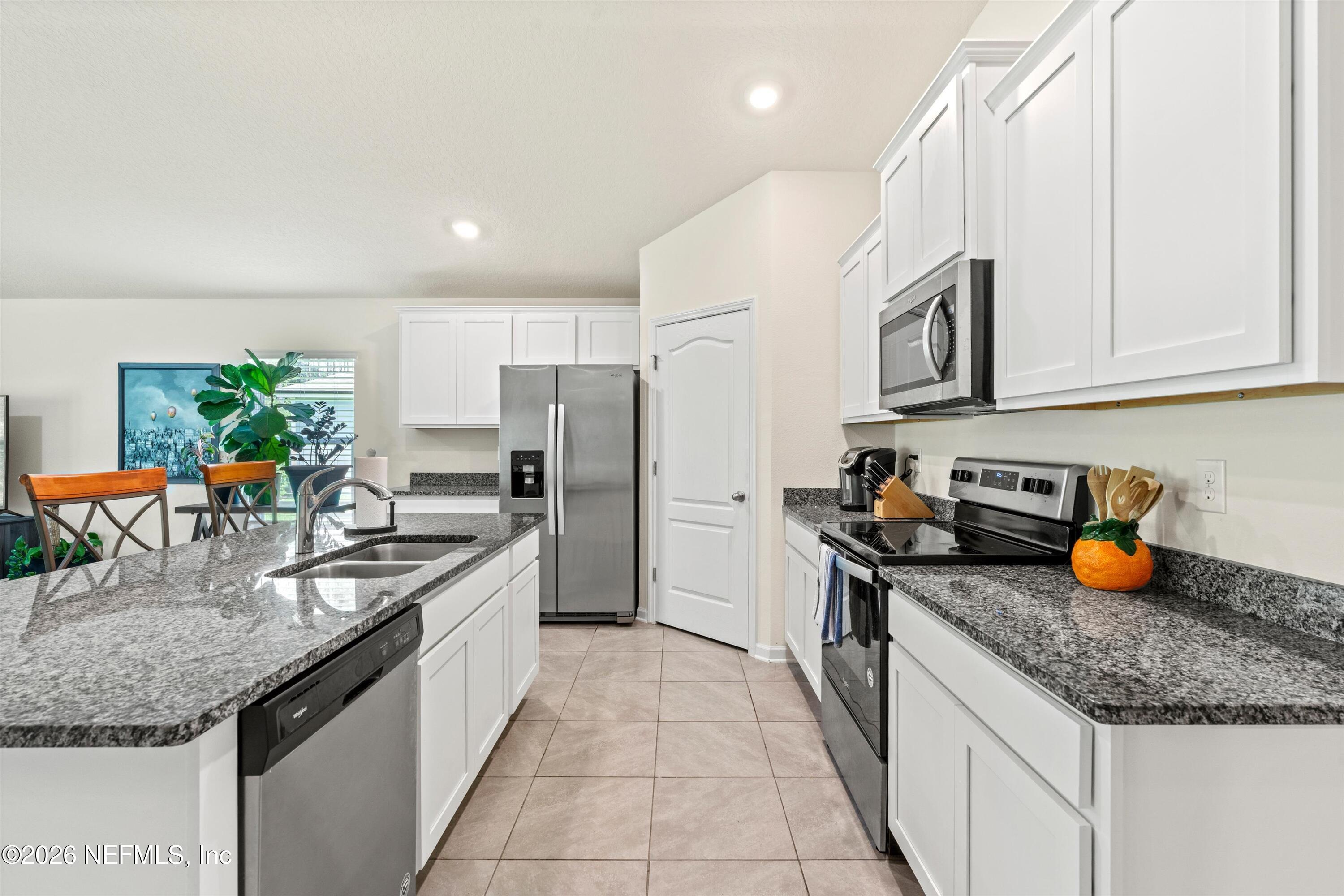 91 Rivertown Road Palm Coast, FL 32137 - Photo 7 of 36 07-Kitchen