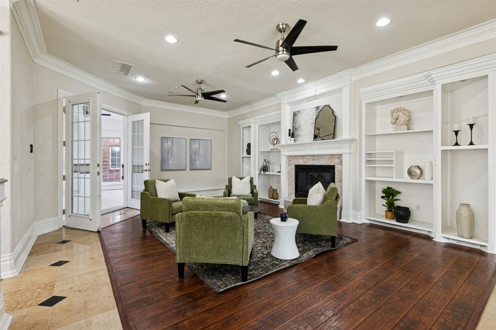469 Apache Trail Keller, TX 76248 - Photo 14 of 39 a living room with furniture and a fireplace