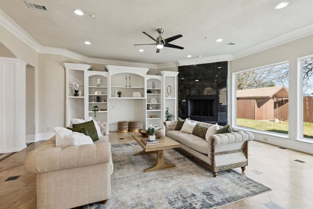 469 Apache Trail Keller, TX 76248 - Photo 18 of 39 a living room with furniture and a large window