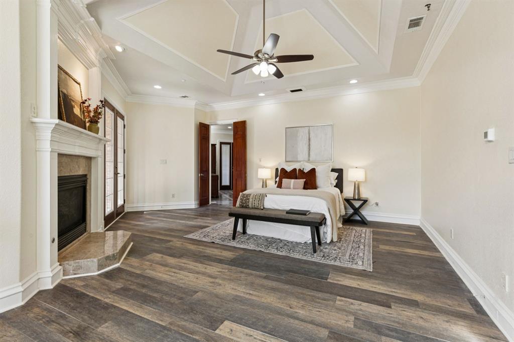 469 Apache Trail Keller, TX 76248 - Photo 22 of 39 a living room with furniture a fireplace and a ceiling fan