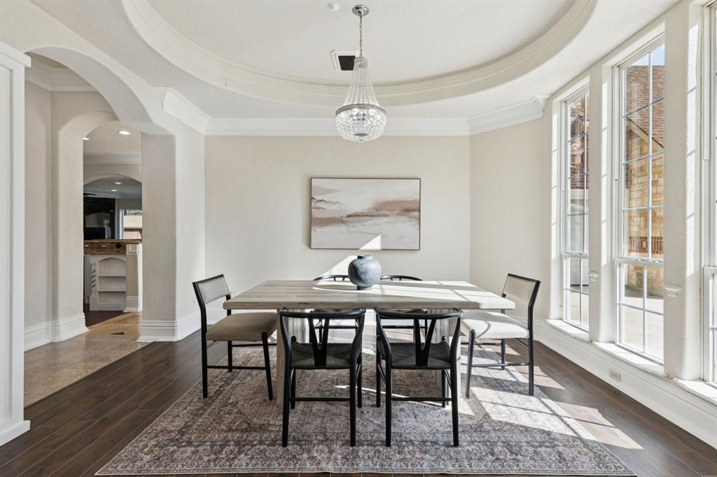 469 Apache Trail Keller, TX 76248 - Photo 10 of 39 a view of a dining room with furniture window and wooden floor