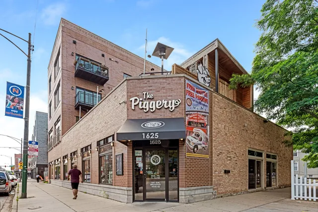 a view of a building with a street