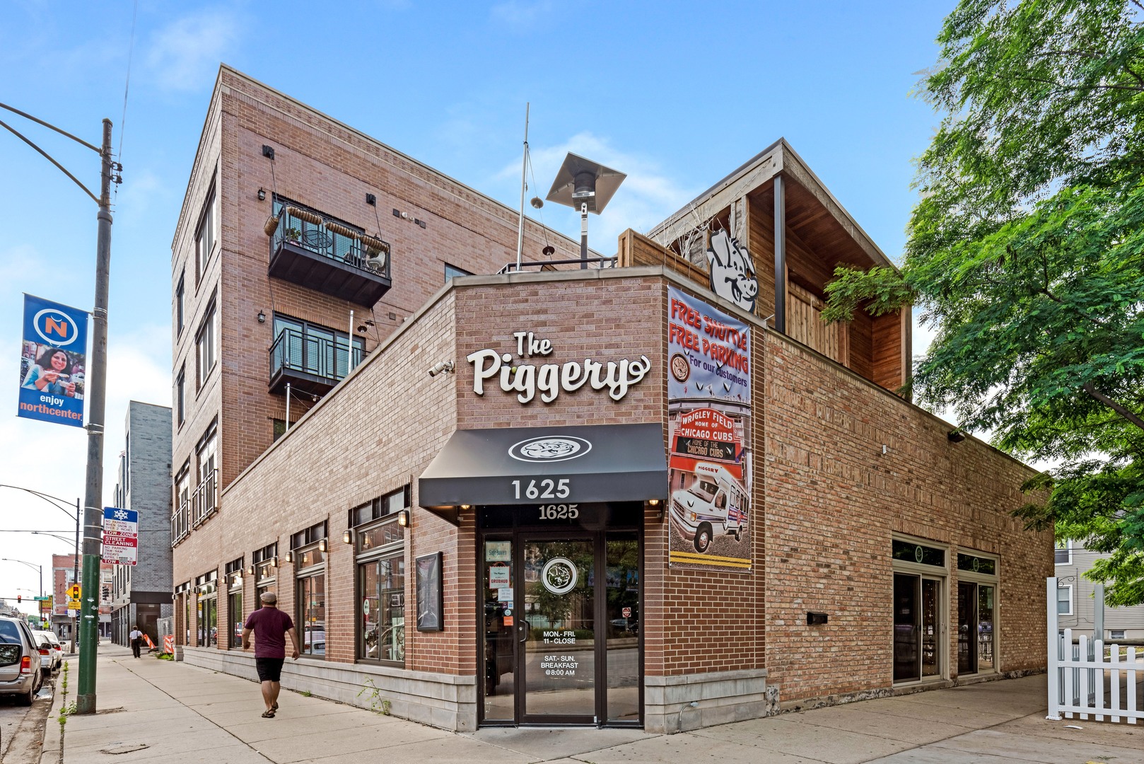 a view of a building with a street