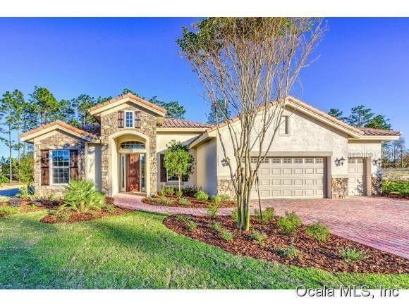 7053 Southwest 179th Ave Road Dunnellon, FL 34432 - Photo 1 of 1 a front view of a house with a yard
