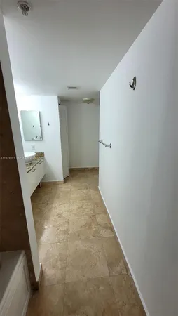 a view of a room with an empty space