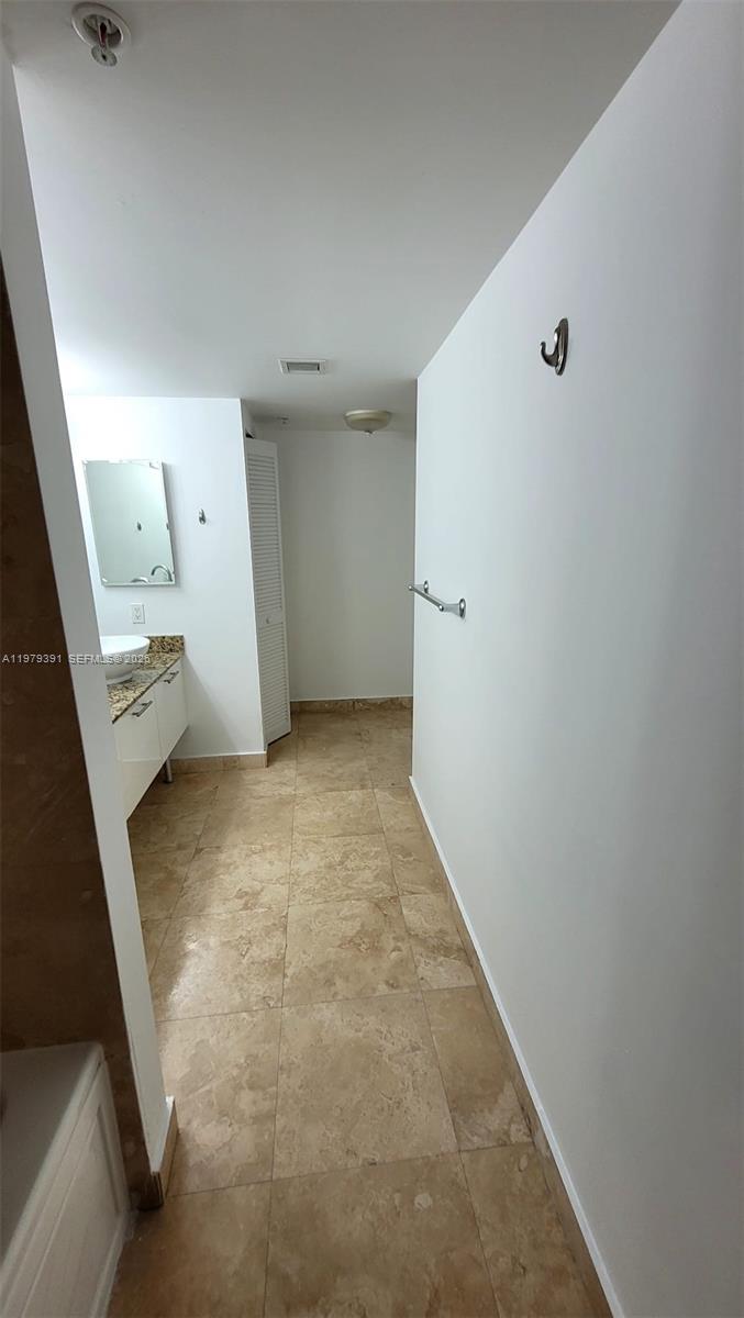 41 Southeast 5th Street, Unit 709 Miami, FL 33131 - Photo 3 of 17 a view of a room with an empty space