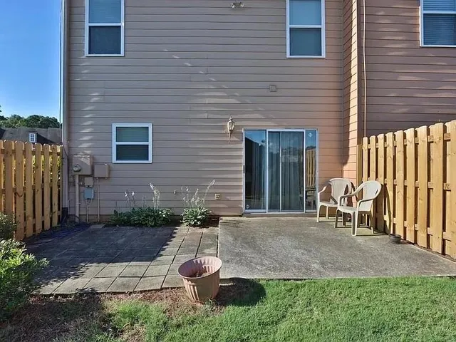 a front view of a house with patio