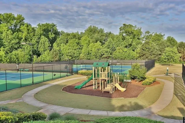 a view of a backyard with sitting area