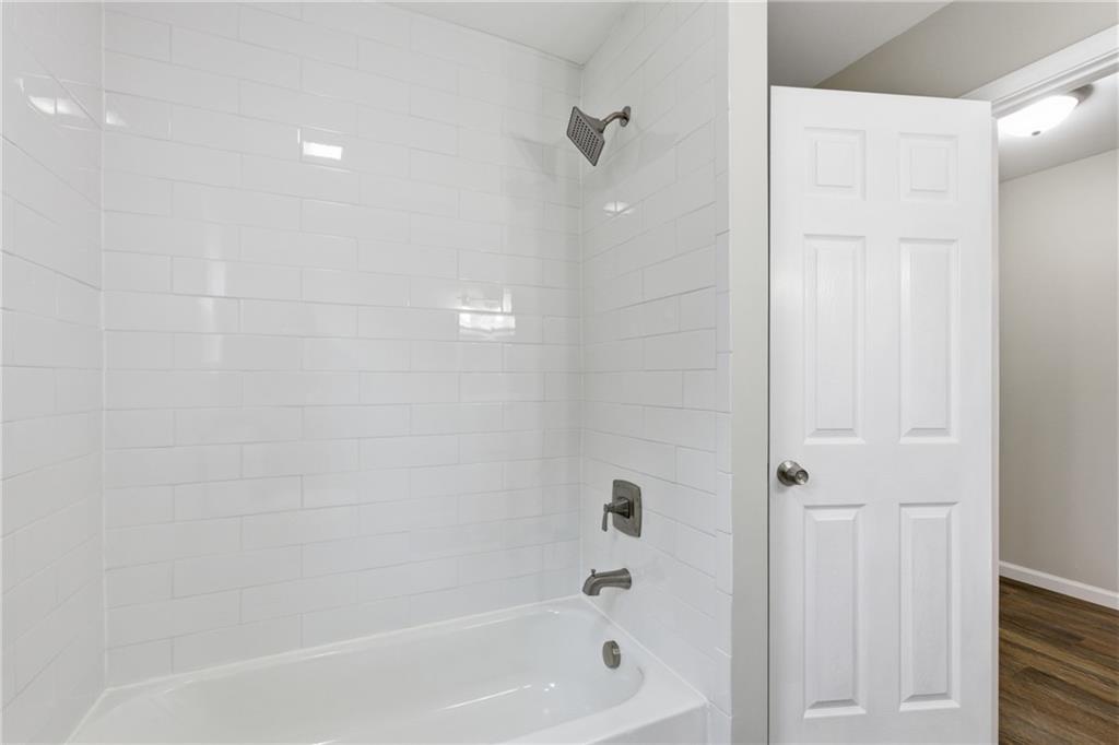 151 Richardson Street Toccoa, GA 30577 - Photo 23 of 36 a bathroom with a bathtub