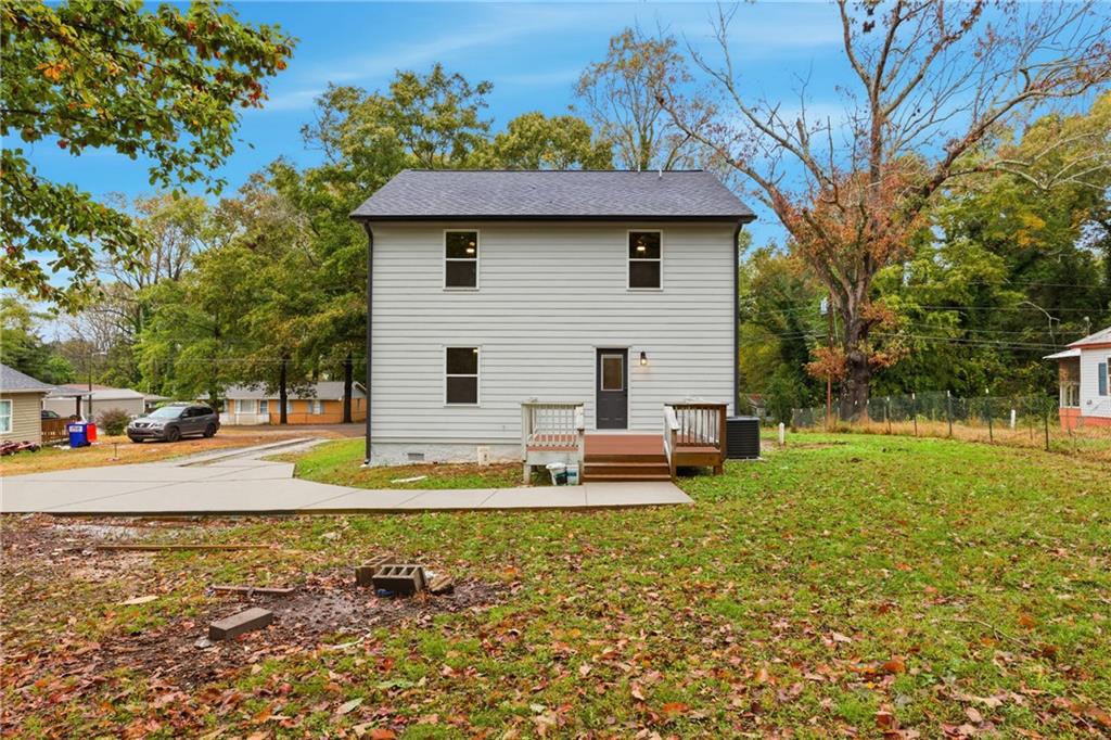 151 Richardson Street Toccoa, GA 30577 - Photo 27 of 36 a view of a house with backyard and sitting area
