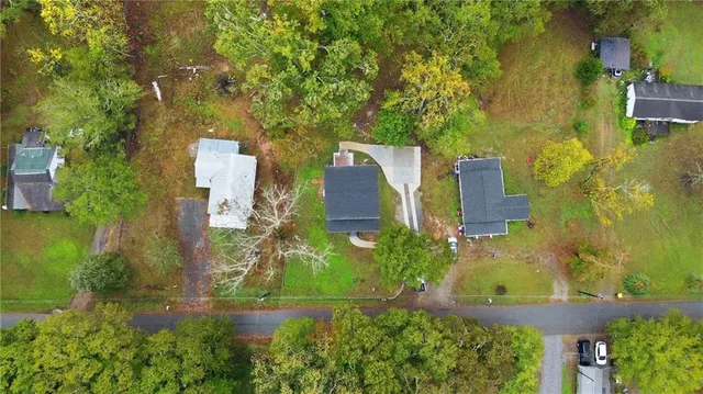 an aerial view of residential house with outdoor space