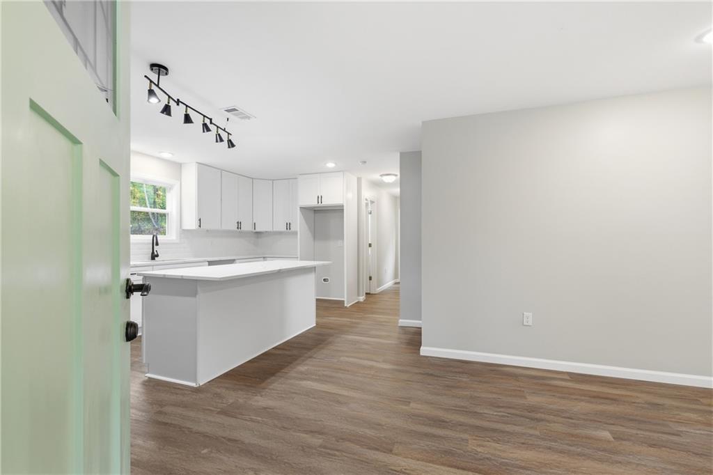151 Richardson Street Toccoa, GA 30577 - Photo 6 of 36 a view of kitchen with wooden floor