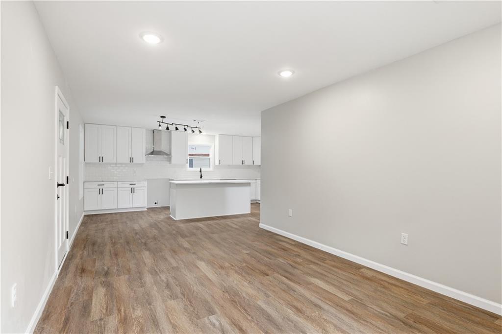 151 Richardson Street Toccoa, GA 30577 - Photo 8 of 36 a view of kitchen with wooden floor