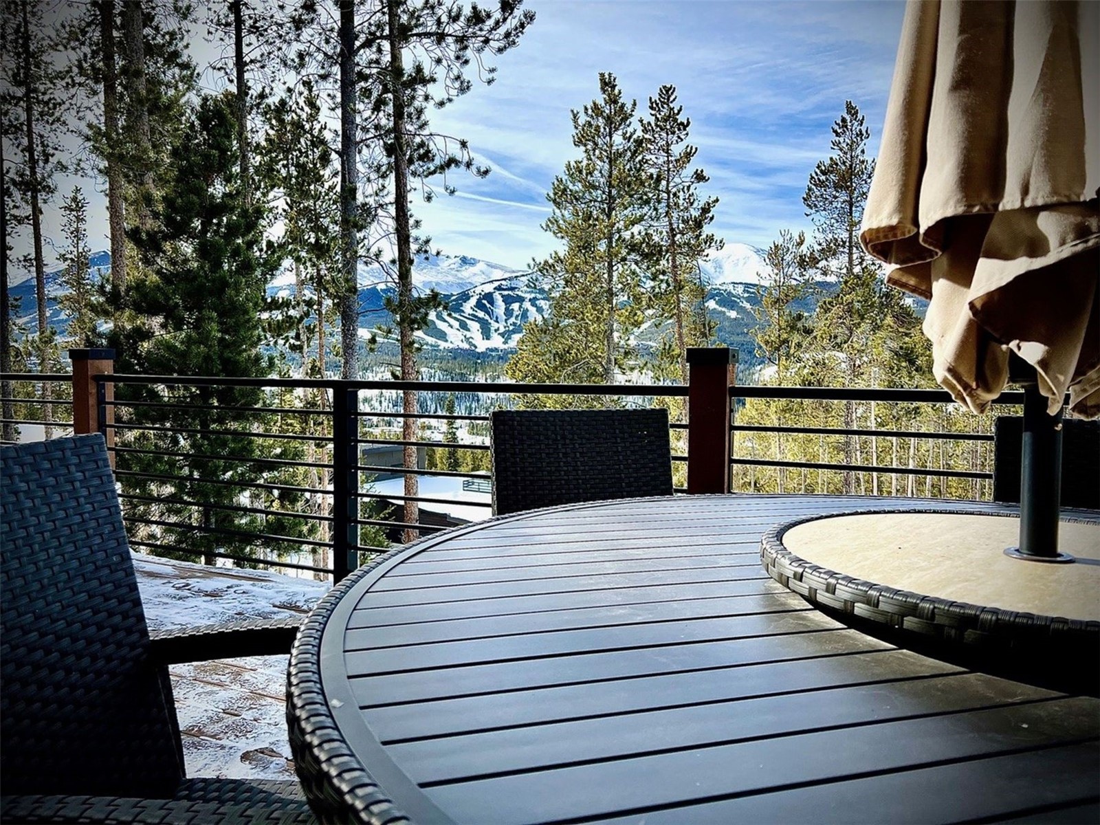 103 Bearing Tree Road Breckenridge, CO 80424 - Photo 6 of 30 a roof deck with wooden floor and fence