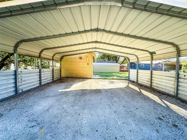 a view of a backyard with a garden