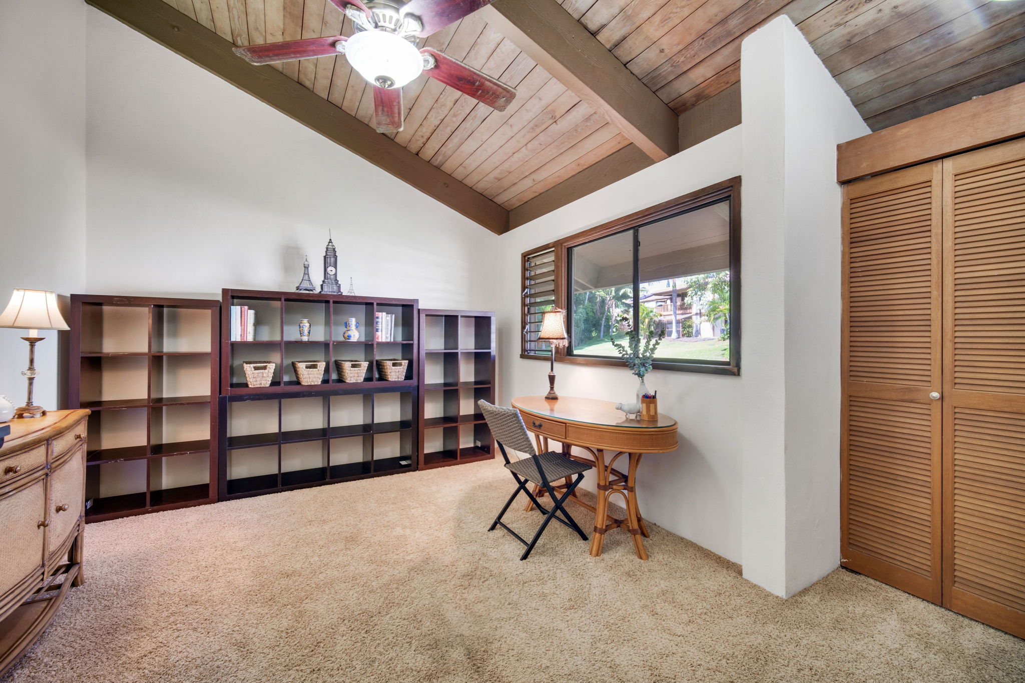4701 Kawaihau Road, Unit F201 Kapaa, HI 96746 - Photo 16 of 24 a view of a livingroom with furniture and window