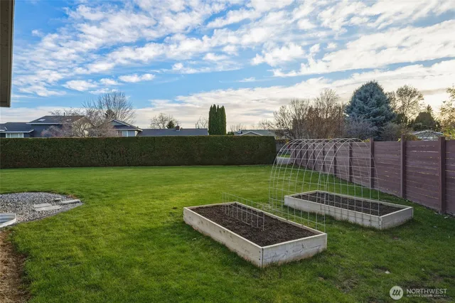 a view of a golf course with a garden