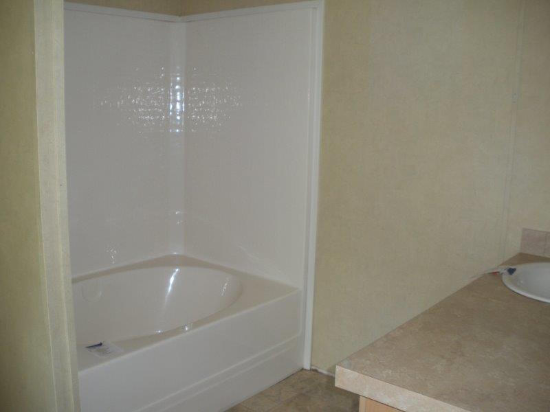 6749 Haw Patch Road Ferrum, VA 24088 - Photo 22 of 30 a bathroom with a bathtub