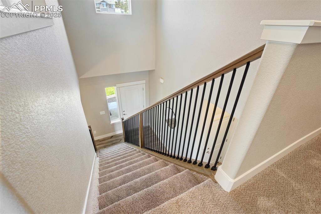 5633 Makalu Drive Colorado Springs, CO 80924 - Photo 22 of 48 a view of a hallway view with staircase