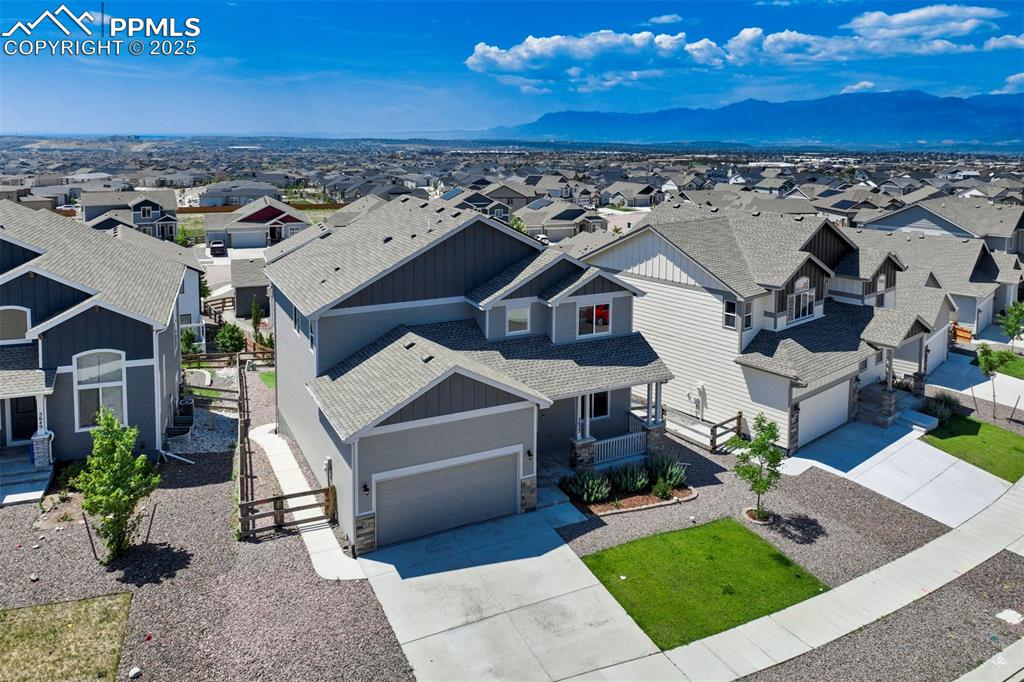 5633 Makalu Drive Colorado Springs, CO 80924 - Photo 3 of 48 an aerial view of a house with a garden